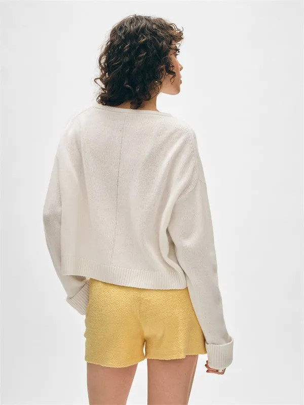 Beige and white solid color V-neck wool sweater