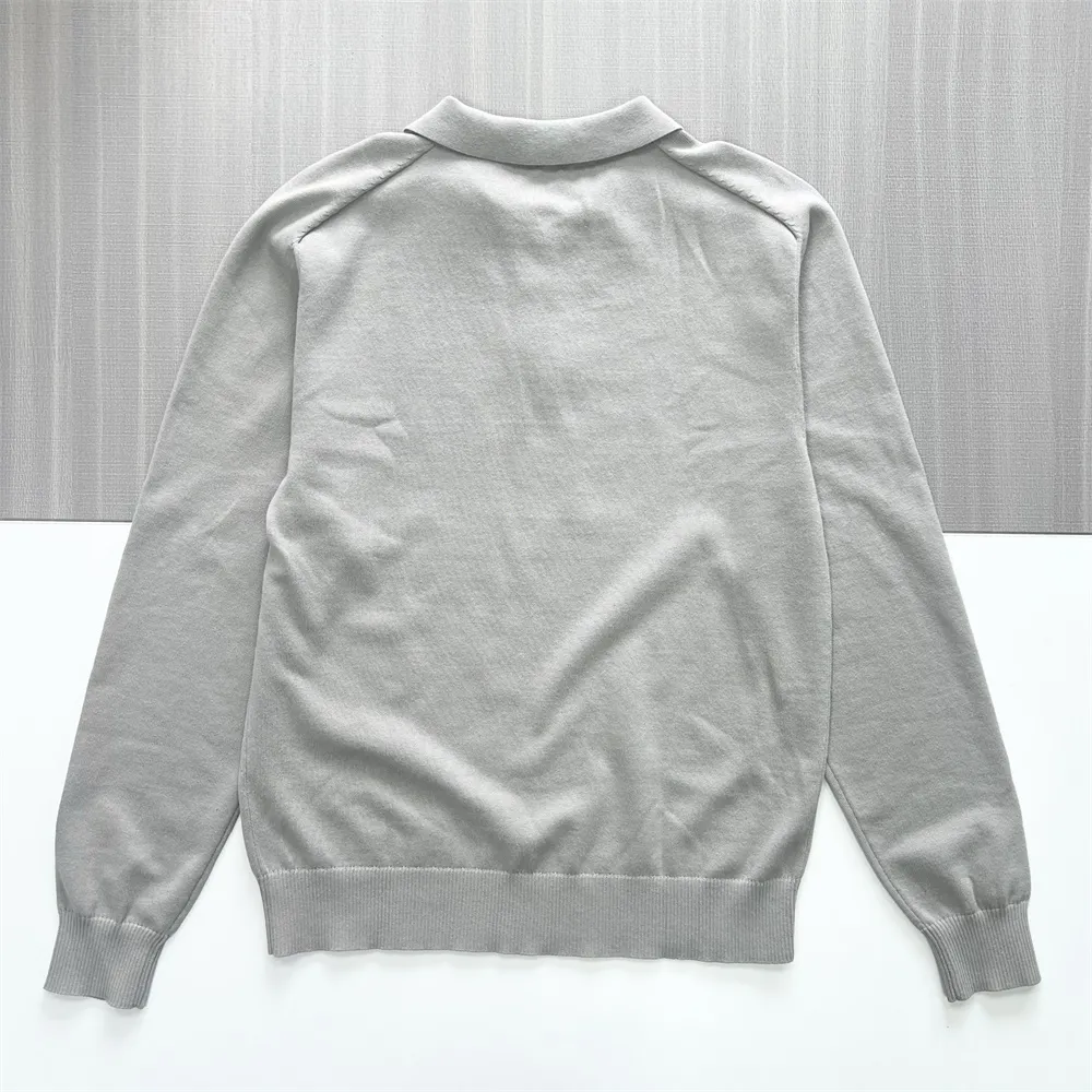 Men's Light Gray Knit Polo: Long-Sleeve, Contrast Buttons, Minimalist Casual