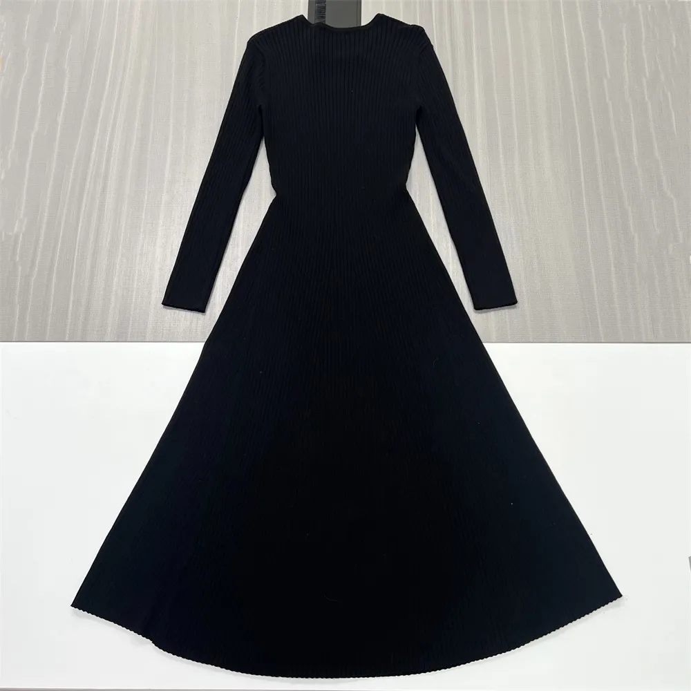 Women's Black Ribbed Knit Midi Dress: Long-Sleeve, Flared Silhouette, Elegant Casual Design