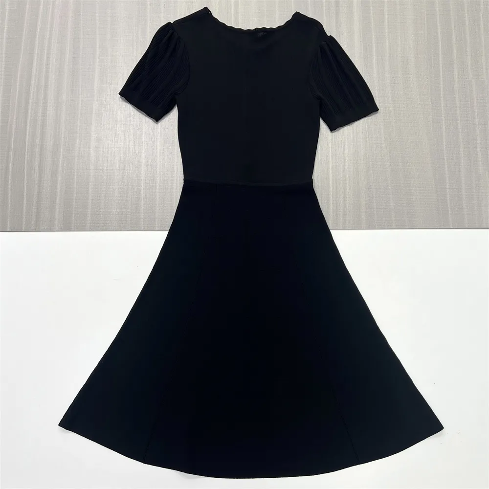 Women's Black Ribbed Midi Dress: Pearl Buttons, Puff Sleeves, Elegant Casual Design
