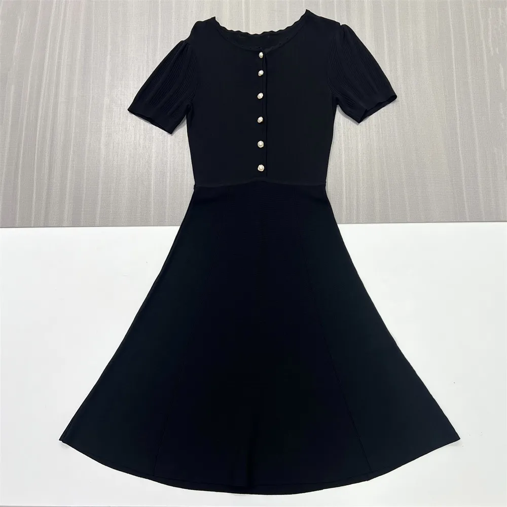 Women's Black Ribbed Midi Dress: Pearl Buttons, Puff Sleeves, Elegant Casual Design