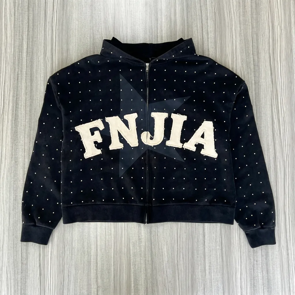 Unisex Black Polka-Dot Zip-Up Hoodie: "FNJIA" Star Graphic